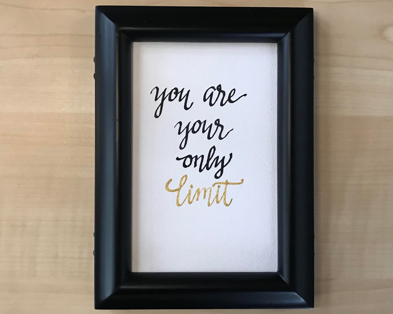 Hand Lettered Calligraphy Quote in black and gold ink, "you are your only limit"
