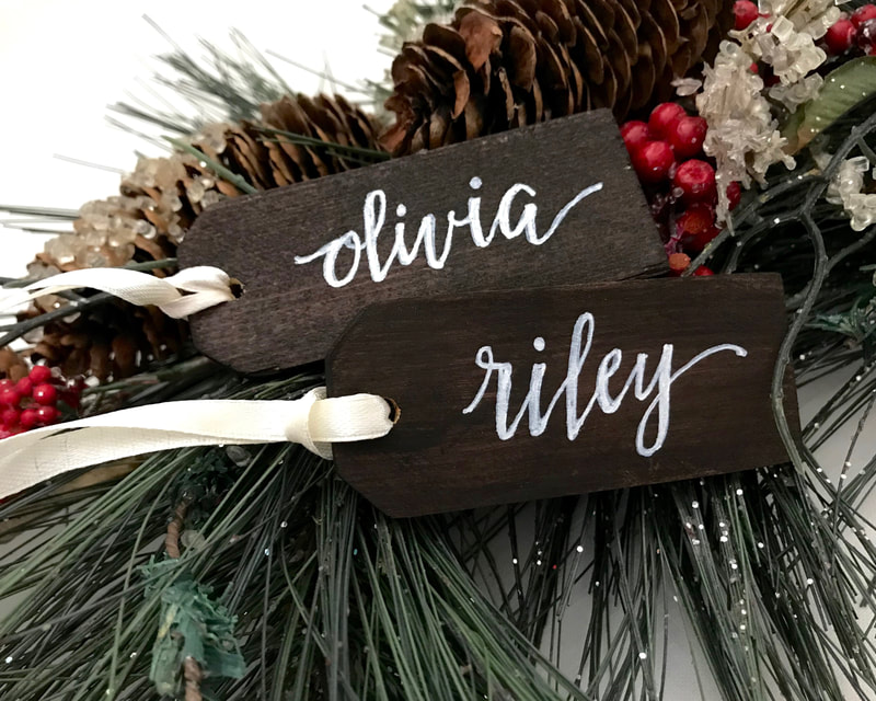Personalized  wooden Christmas nametags in hand lettered calligraphy 